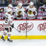 Dec 20, 2025; Ottawa, Ontario, CAN; Chicago Blackhawks left wing Nick Lardis (76) celebrates scoring his first NHL goal with team on the bench in the third period against the Ottawa Senators at the Canadian Tire Centre. Mandatory Credit: Marc DesRosiers-IMAGN Images