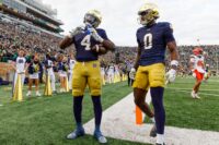 Notre Dame running back Jeremiyah Love (4) makes a heart sign after scoring a touchdown in the first half of a NCAA football game against Syracuse at Notre Dame Stadium on Saturday, Nov. 22, 2025, in South Bend.
