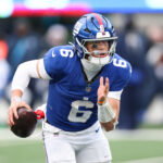 Jan 4, 2026; East Rutherford, New Jersey, USA; New York Giants quarterback Jaxson Dart (6) scrambles during the fourth quarter against the Dallas Cowboys at MetLife Stadium.