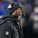 Jan 4, 2026; Orchard Park, New York, USA; New York Jets head coach Aaron Glenn looks on during the second half against the Buffalo Bills at Highmark Stadium. Mandatory Credit: Mark Konezny-Imagn Images