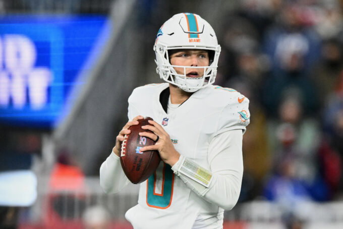 Jan 4, 2026; Foxborough, Massachusetts, USA; Miami Dolphins quarterback Zach Wilson (0) looks to throw a pass against the New England Patriots during the fourth quarter at Gillette Stadium. Mandatory Credit: Brian Fluharty-Imagn Images