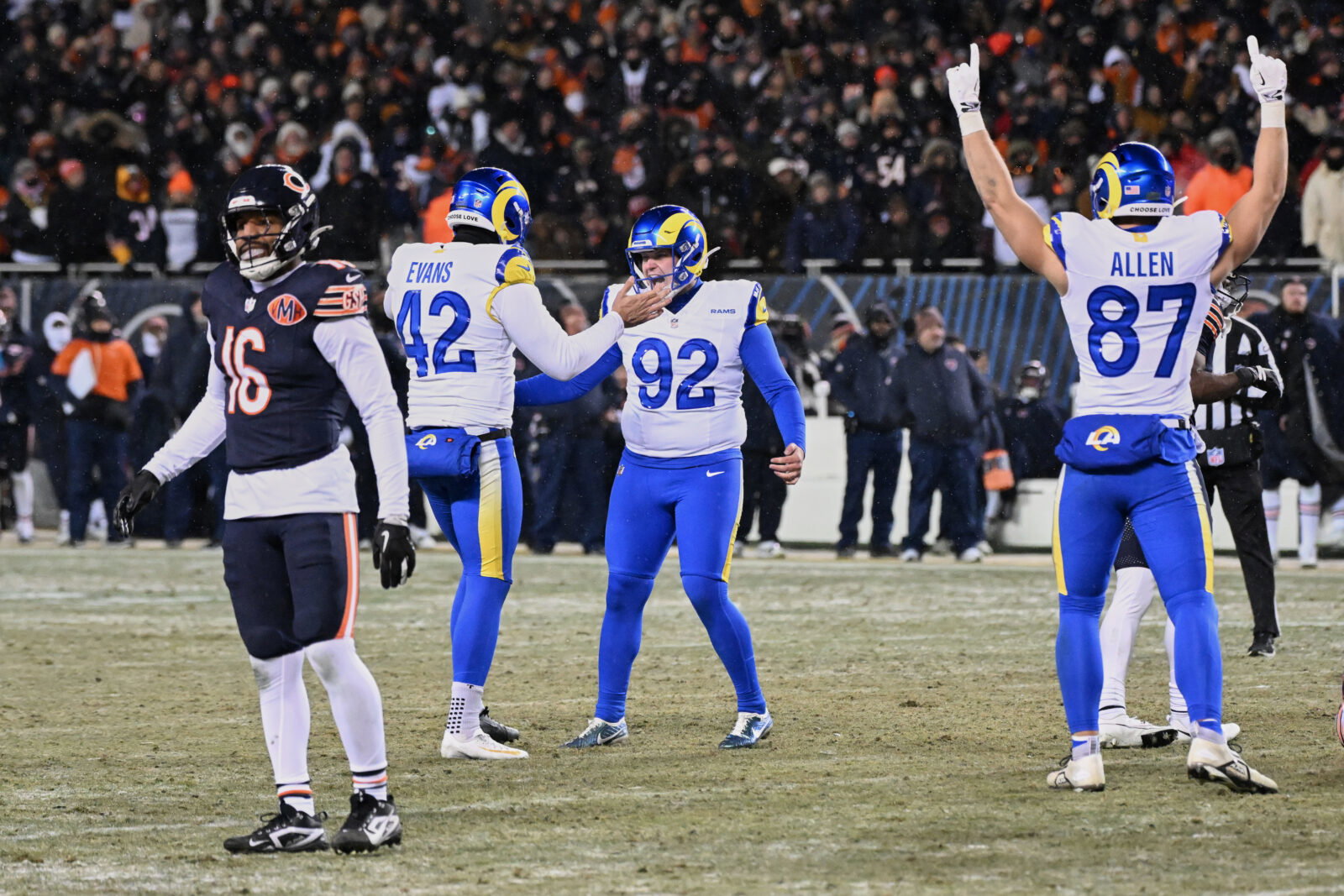 Jan 18, 2026; Chicago, IL, USA; Los Angeles Rams placekicker Harrison Mevis (92) reacts with punter Ethan Evans (42) and tight end Davis Allen (87) after kicking the game-winning forty-two yard field goal against the Chicago Bears during overtime of an NFC Divisional Round game at Soldier Field. Mandatory Credit: Matt Marton-Imagn Images