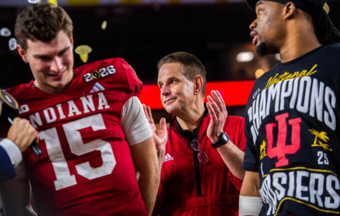 Indiana Head Coach Curt Cignetti claps on the podium after the College Football Playoff National Championship college football game at Hard Rock Stadium in Miami Gardens on Monday, Jan. 19, 2026.