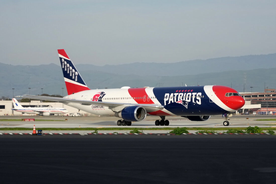 Feb 1, 2026; Santa Clara, CA, USA; The New England Patriots private Boeing 767-300 team airplane (registration N36NE) arrives to Super Bowl LX at San Jose Mineta International Airport. Mandatory Credit: Kirby Lee-Imagn Images
