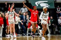 Maryland's Oluchi Okananwa, center, celebrates her 3-pointer against Michigan State during the third quarter on Wednesday, Feb. 4, 2026, at the Breslin Center in East Lansing.