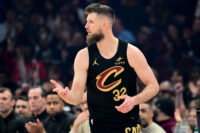 Feb 19, 2026; Cleveland, Ohio, USA; Cleveland Cavaliers forward Dean Wade (32) celebrates after hitting a three point basket against the Brooklyn Nets during the first quarter at Rocket Arena.