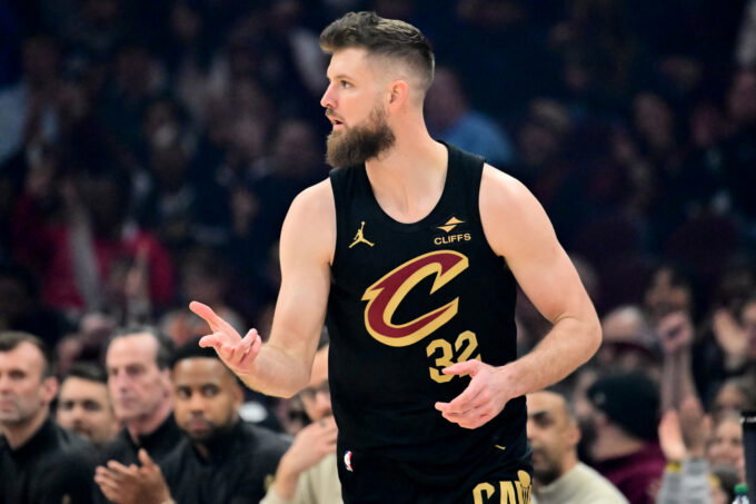 Feb 19, 2026; Cleveland, Ohio, USA; Cleveland Cavaliers forward Dean Wade (32) celebrates after hitting a three point basket against the Brooklyn Nets during the first quarter at Rocket Arena.