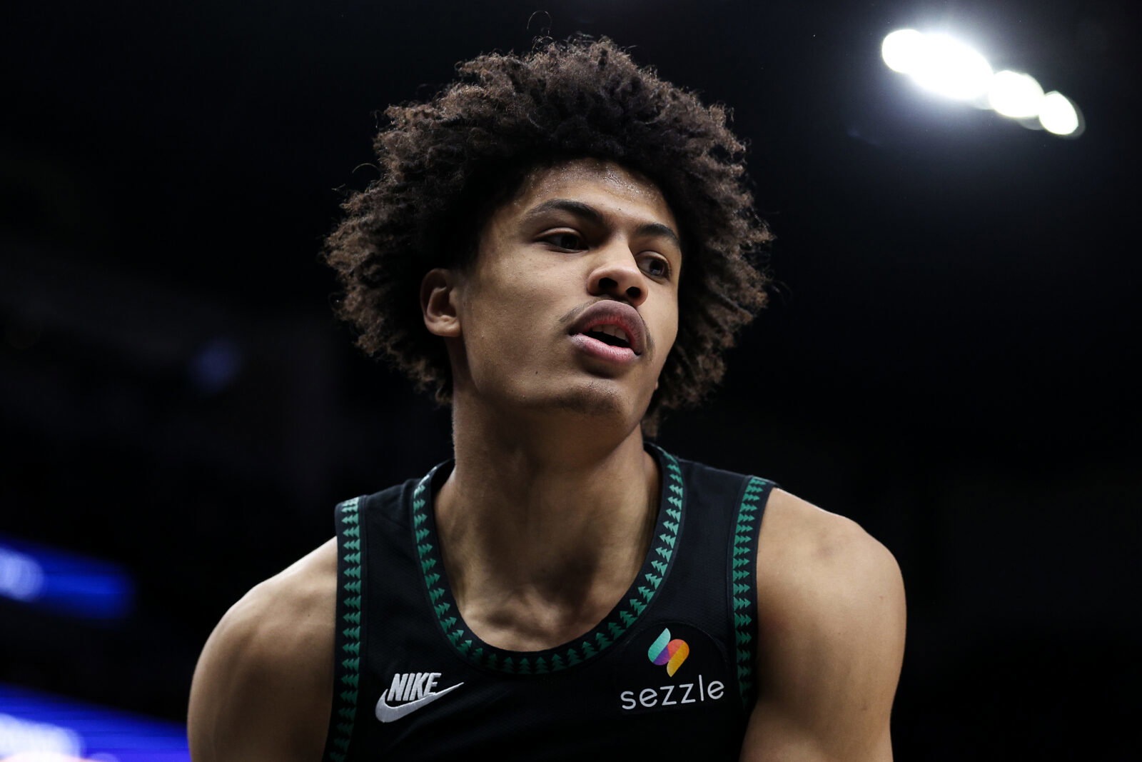 Feb 22, 2026; Minneapolis, Minnesota, USA; Minnesota Timberwolves forward Joan Beringer (19) looks on during the second half against the Philadelphia 76ers at Target Center.
