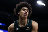 Feb 22, 2026; Minneapolis, Minnesota, USA; Minnesota Timberwolves forward Joan Beringer (19) looks on during the second half against the Philadelphia 76ers at Target Center.