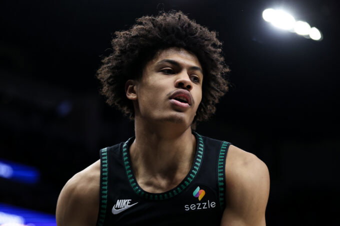 Feb 22, 2026; Minneapolis, Minnesota, USA; Minnesota Timberwolves forward Joan Beringer (19) looks on during the second half against the Philadelphia 76ers at Target Center.