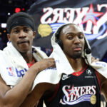 Feb 26, 2026; Philadelphia, Pennsylvania, USA; Philadelphia 76ers guard Tyrese Maxey (R) and guard Vj Edgecombe (L) react after a victory against the Miami Heat at Xfinity Mobile Arena. Mandatory Credit: Bill Streicher-Imagn Images