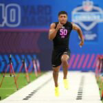 Feb 27, 2026; Indianapolis, IN, USA; Ohio State defensive back Lorenzo Styles (DB50) runs in the 40-yard dash during the NFL Scouting Combine at Lucas Oil Stadium. Mandatory Credit: Kirby Lee-Imagn Images
