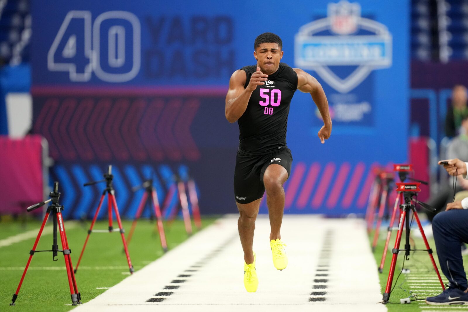 Feb 27, 2026; Indianapolis, IN, USA; Ohio State defensive back Lorenzo Styles (DB50) runs in the 40-yard dash during the NFL Scouting Combine at Lucas Oil Stadium. Mandatory Credit: Kirby Lee-Imagn Images