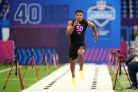 Feb 27, 2026; Indianapolis, IN, USA; Ohio State defensive back Lorenzo Styles (DB50) runs in the 40-yard dash during the NFL Scouting Combine at Lucas Oil Stadium. Mandatory Credit: Kirby Lee-Imagn Images