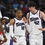 Mar 14, 2026; Inglewood, California, USA; Sacramento Kings center Maxime Raynaud (42) talks to guard Russell Westbrook (18) against the LA Clippers during the first quarter at Intuit Dome. Mandatory Credit: Jonathan Hui-Imagn Images