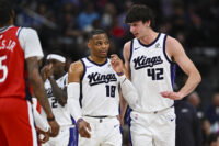 Mar 14, 2026; Inglewood, California, USA; Sacramento Kings center Maxime Raynaud (42) talks to guard Russell Westbrook (18) against the LA Clippers during the first quarter at Intuit Dome. Mandatory Credit: Jonathan Hui-Imagn Images