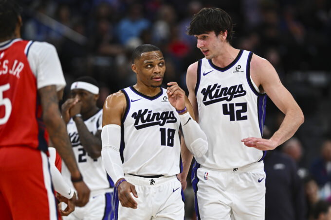 Mar 14, 2026; Inglewood, California, USA; Sacramento Kings center Maxime Raynaud (42) talks to guard Russell Westbrook (18) against the LA Clippers during the first quarter at Intuit Dome. Mandatory Credit: Jonathan Hui-Imagn Images