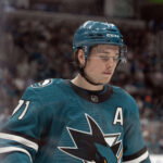 Mar 19, 2026; San Jose, California, USA; San Jose Sharks center Macklin Celebrini (71) awaits the resumption of play against the Buffalo Sabres during the second period at SAP Center at San Jose.