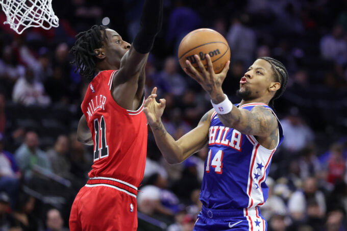 Mar 25, 2026; Philadelphia, Pennsylvania, USA; Philadelphia 76ers forward Dalen Terry (14) drives against Chicago Bulls forward Leonard Miller (11) during the fourth quarter at Xfinity Mobile Arena. Mandatory Credit: