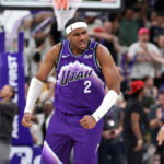 Mar 25, 2026; Salt Lake City, Utah, USA; Utah Jazz forward Blake Hinson (2) celebrates after scoring a three point basket and getting fouled during the second half against the Washington Wizards at Delta Center. Mandatory Credit: Chris Nicoll-Imagn Images