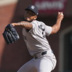 Mar 27, 2026; San Francisco, California, USA; New York Yankees pitcher Camilo Doval (75) throws a pitch against the San Francisco Giants during the eighth inning at Oracle Park. Mandatory Credit: Darren Yamashita-Imagn Images
