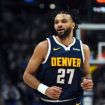 Mar 27, 2026; Denver, Colorado, USA; Denver Nuggets guard Jamal Murray (27) after making a three-pointer during the first half against the Utah Jazz at Ball Arena.