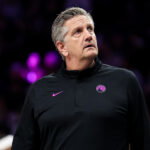 Mar 28, 2026; Minneapolis, Minnesota, USA; Minnesota Timberwolves head coach Chris Finch looks on during the first half against the Detroit Pistons at Target Center.