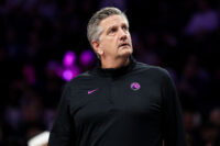 Mar 28, 2026; Minneapolis, Minnesota, USA; Minnesota Timberwolves head coach Chris Finch looks on during the first half against the Detroit Pistons at Target Center.