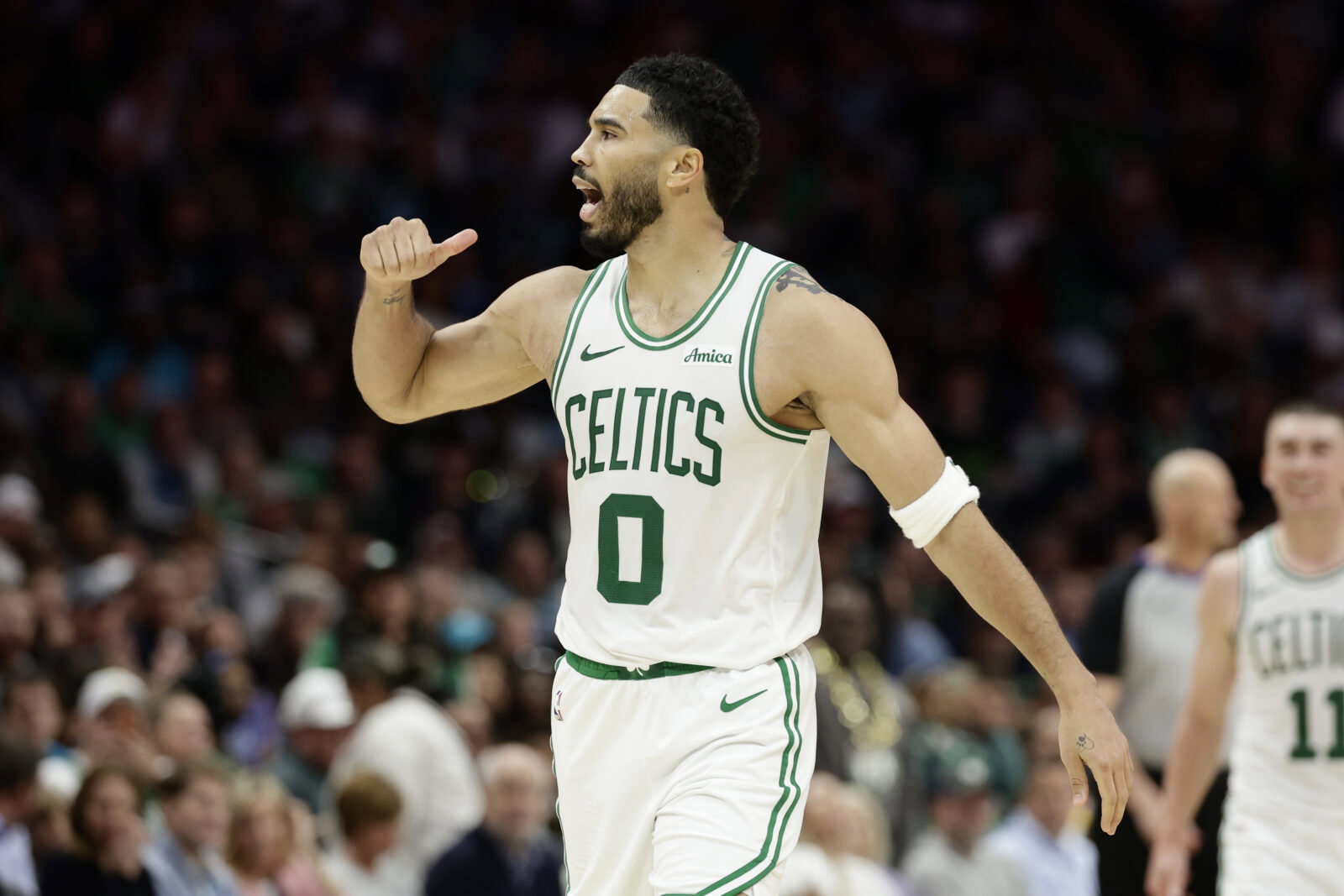 Mar 29, 2026; Charlotte, North Carolina, USA; Boston Celtics forward/guard Jayson Tatum (0) reacts to the crowd after making a basket during the second half against the Charlotte Hornets at Spectrum Center. Mandatory Credit: Brian Westerholt-Imagn Images