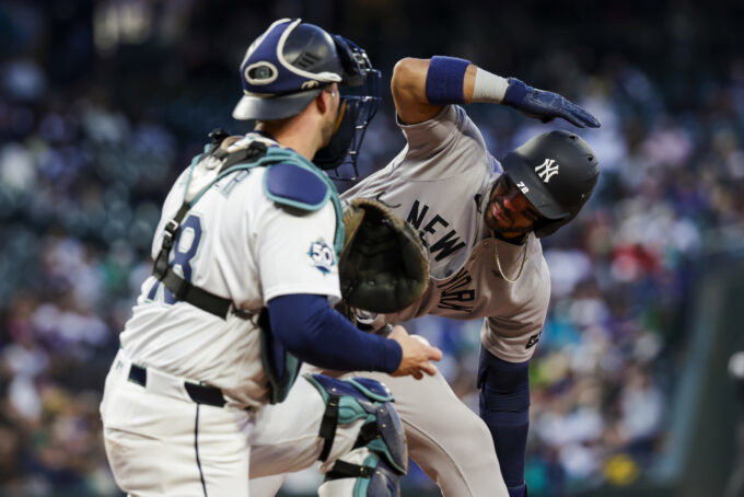 Mar 30, 2026; Seattle, Washington, USA; New York Yankees shortstop Jose Caballero (72) signals for an ABS challenge on a pitch by the Seattle Mariners during the third inning at T-Mobile Park. The strike was overturned and Caballero walked. Mandatory Credit: Joe Nicholson-Imagn Images