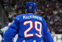 Apr 1, 2026; Denver, Colorado, USA; Colorado Avalanche center Nathan MacKinnon (29) during the second period against the Vancouver Canucks at Ball Arena. Mandatory Credit: Ron Chenoy-Imagn Images