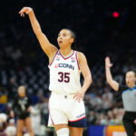 Apr 3, 2026; Phoenix, AZ, USA; UConn Huskies guard Azzi Fudd (35) reacts in the first quarter against the South Carolina Gamecocks during a semifinal of the Final Four of the women's 2026 NCAA Tournament at Mortgage Matchup Center. Mandatory Credit: Kirby Lee-Imagn Images
