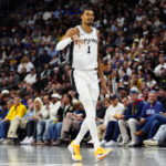 Apr 4, 2026; Denver, Colorado, USA; San Antonio Spurs forward Victor Wembanyama (1) reacts in the second half against the Denver Nuggets at Ball Arena. Mandatory Credit: Ron Chenoy-Imagn Images