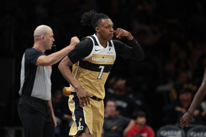 Apr 5, 2026; Brooklyn, New York, USA; Washington Wizards guard Bub Carrington (7) reacts after making a three point basket during the second half against the Brooklyn Nets at Barclays Center. Mandatory Credit: