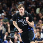 Apr 5, 2026; Dallas, Texas, USA; Dallas Mavericks forward Cooper Flagg (32) reacts after scoring against the Los Angeles Lakers during the second half at American Airlines Center. Mandatory Credit: Kevin Jairaj-Imagn Images