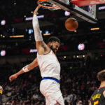 Apr 6, 2026; Atlanta, Georgia, USA; New York Knicks center Karl-Anthony Towns (32) dunks against the Atlanta Hawks during the first half at State Farm Arena. Mandatory Credit: Dale Zanine-Imagn Images