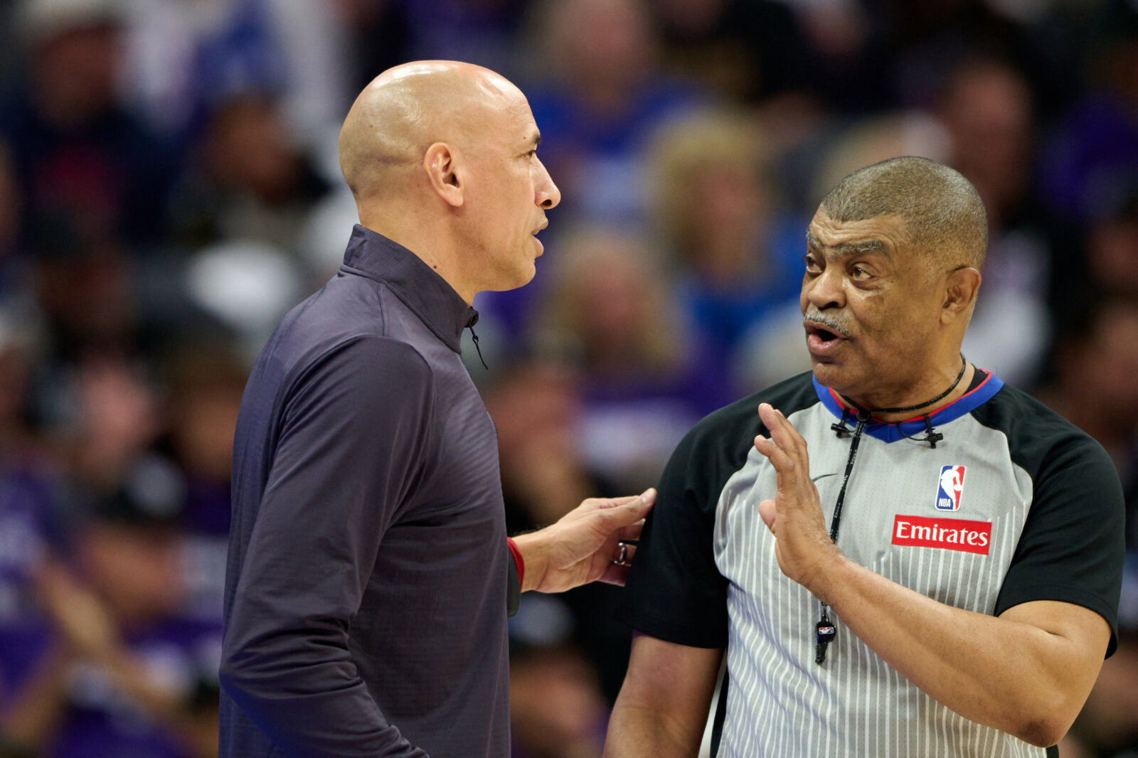 Apr 10, 2026; Sacramento, California, USA; Sacramento Kings head coach Doug Christie talks with referee Tony Brothers (25) during the first half against the against the Golden State Warriors at Golden 1 Center. Mandatory Credit: Robert Edwards-Imagn Images