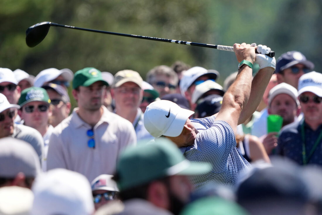 Apr 11, 2026; Augusta, Georgia, USA; Rory McIlroy tees off on the first hole during the third round of the Masters Tournament at Augusta National Golf Club. Mandatory Credit: Michael Madrid-Imagn Images
