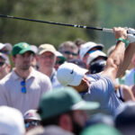 Apr 11, 2026; Augusta, Georgia, USA; Rory McIlroy tees off on the first hole during the third round of the Masters Tournament at Augusta National Golf Club. Mandatory Credit: Michael Madrid-Imagn Images
