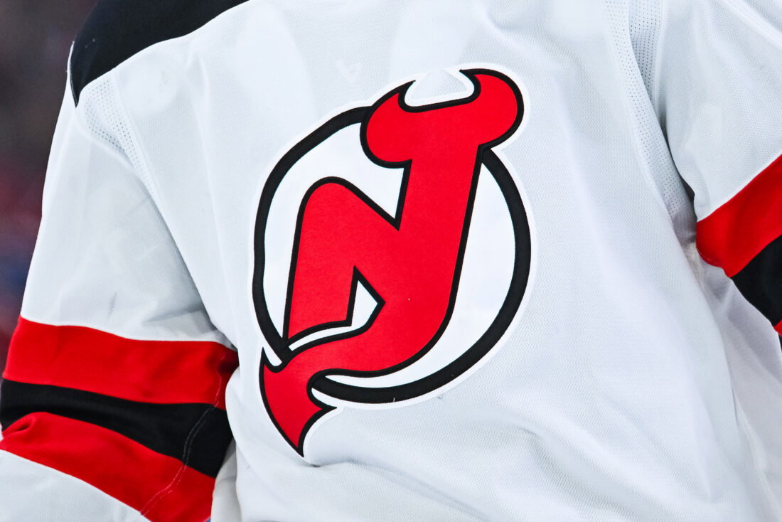 Apr 5, 2026; Montreal, Quebec, CAN; View of a New Jersey Devils logo on a jersey worn by a member of the team during the second period at Bell Centre. Mandatory Credit: David Kirouac-Imagn Images