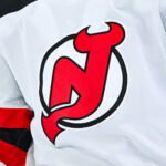 Apr 5, 2026; Montreal, Quebec, CAN; View of a New Jersey Devils logo on a jersey worn by a member of the team during the second period at Bell Centre. Mandatory Credit: David Kirouac-Imagn Images