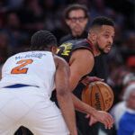Apr 18, 2026; New York, New York, USA; Atlanta Hawks guard CJ McCollum (3) is guarded by New York Knicks guard Miles McBride (2) during the second half of the 2026 NBA Playoffs at Madison Square Garden. Mandatory Credit: Vincent Carchietta-Imagn Images