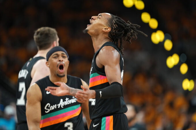 Apr 19, 2026; San Antonio, Texas, USA; San Antonio Spurs guard Devin Vassell (24) reacts after scoring a three-point basket during the second half of game one of the first round of the 2026 NBA Playoffs against the Portland Trail Blazers at Frost Bank Center. Mandatory Credit: Scott Wachter-Imagn Images