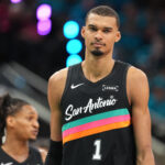 Apr 19, 2026; San Antonio, Texas, USA; San Antonio Spurs forward Victor Wembanyama (1) reacts to a call by an official during the second half of game one of the first round of the 2026 NBA Playoffs against the Portland Trail Blazers at Frost Bank Center. Mandatory Credit: Scott Wachter-Imagn Images
