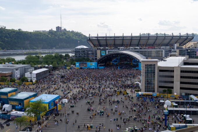 Fans begin to file into the standing room section of the NFL Draft Theater ahead of Night 2 of the 2026 NFL Draft outside Acrisure Stadium, Friday, April 24, 2026 in Pittsburgh, Pa.