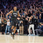 Apr 25, 2026; Minneapolis, Minnesota, USA; Minnesota Timberwolves guard Ayo Dosunmu (13) celebrates with fans after making a three-point shot against the Denver Nuggets in the fourth quarter at Target Center. Mandatory Credit: Matt Blewett-Imagn Images