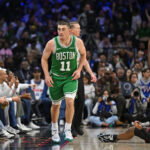 Apr 26, 2026; Philadelphia, Pennsylvania, USA; Boston Celtics guard Payton Pritchard (11) reacts after making a three point basket against the Philadelphia 76ers during the second half at Xfinity Mobile Arena. Mandatory Credit: