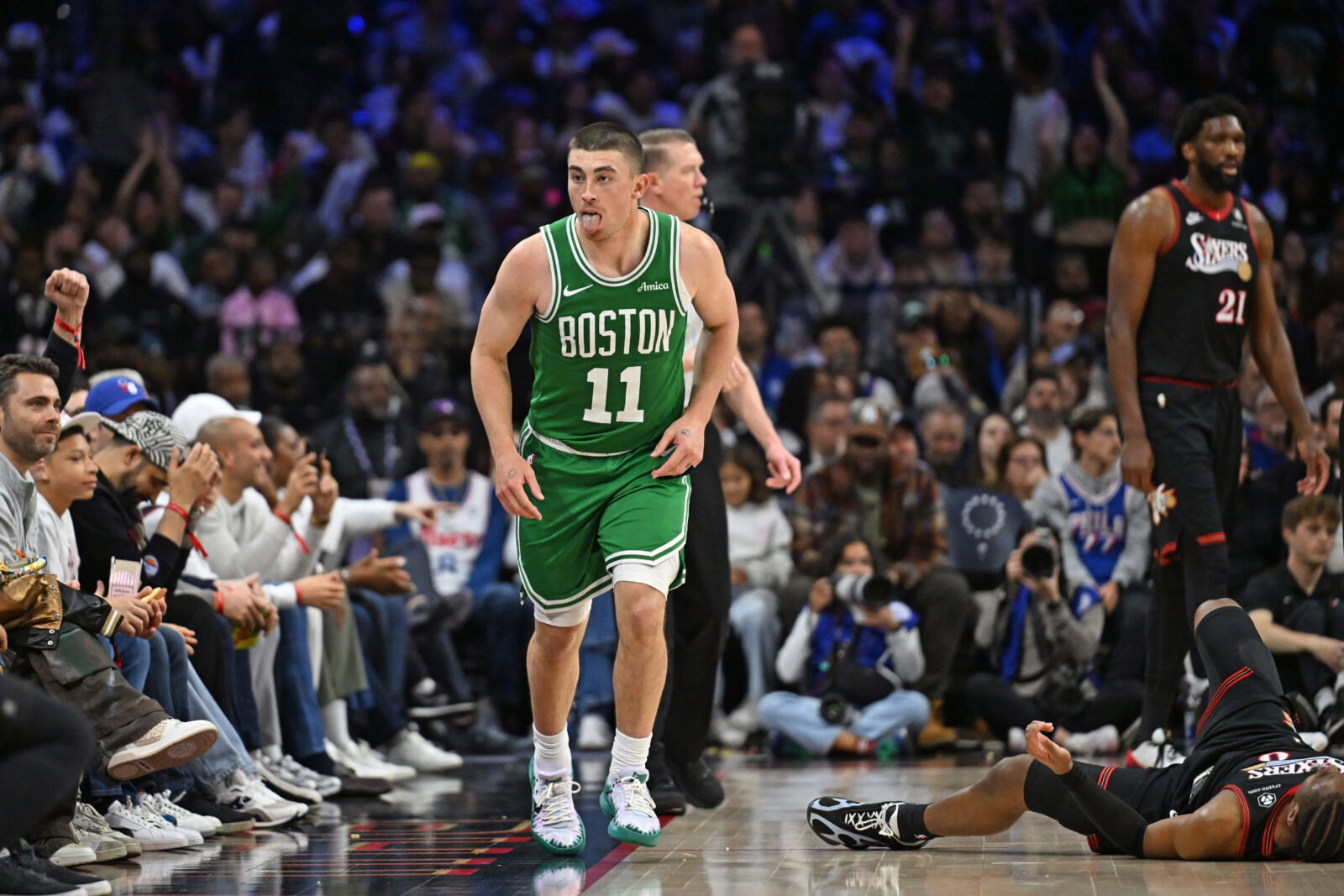Apr 26, 2026; Philadelphia, Pennsylvania, USA; Boston Celtics guard Payton Pritchard (11) reacts after making a three point basket against the Philadelphia 76ers during the second half at Xfinity Mobile Arena. Mandatory Credit: