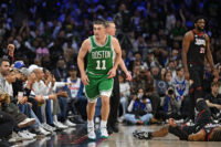 Apr 26, 2026; Philadelphia, Pennsylvania, USA; Boston Celtics guard Payton Pritchard (11) reacts after making a three point basket against the Philadelphia 76ers during the second half at Xfinity Mobile Arena. Mandatory Credit: