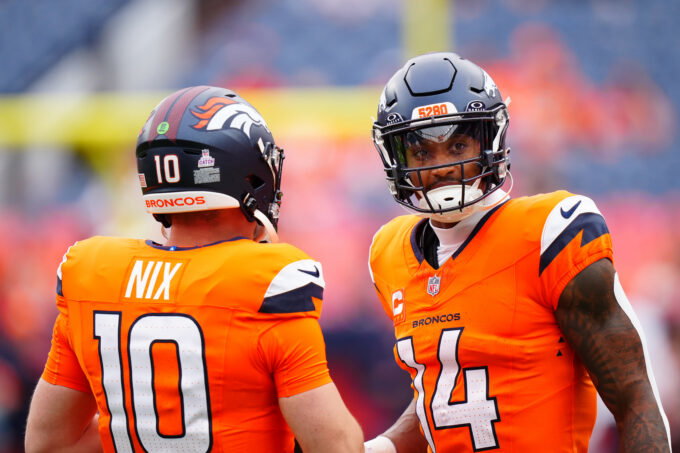 Oct 27, 2024; Denver, Colorado, USA; Denver Broncos quarterback Bo Nix (10) and wide receiver Courtland Sutton (14) before the game against the Carolina Panthers at Empower Field at Mile High. Mandatory Credit: Ron Chenoy-Imagn Images
